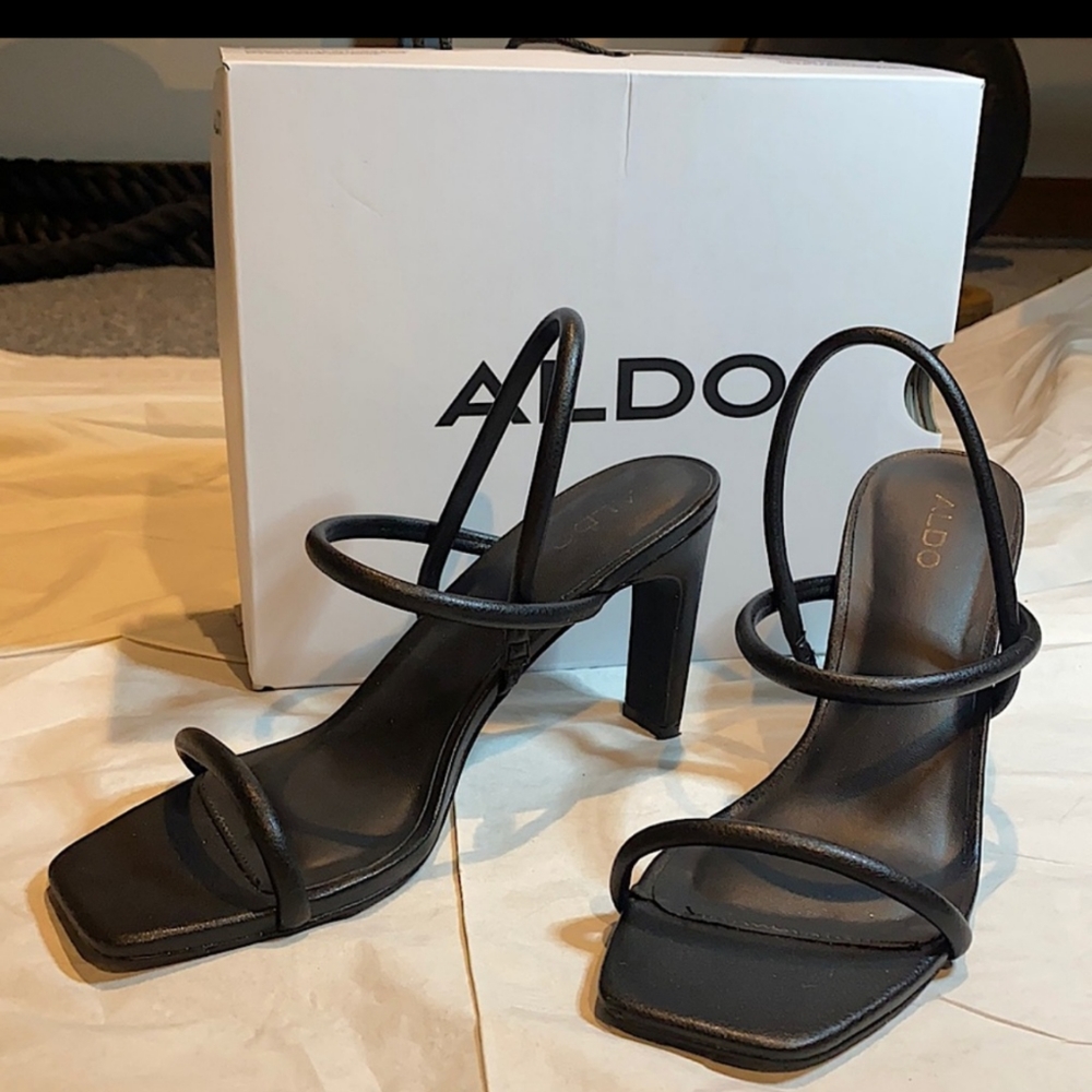 Aldo black strappy shoes.